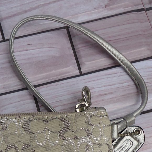 Coach wristlet with classic signature print canvas. - Picture 16 of 16